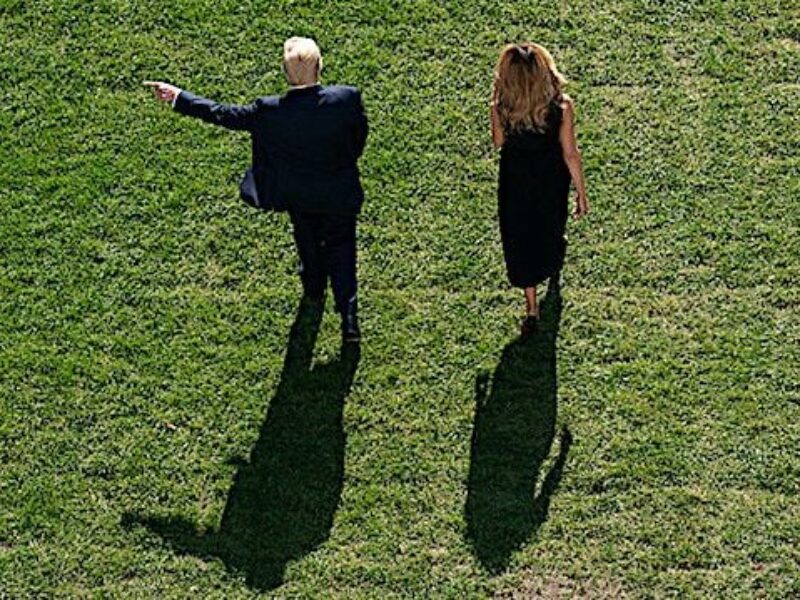 President Donald J. Trump and First Lady Melania Trump greet White House staff members waving American flags as they depart the South Portico entrance of the White House Thursday, Oct. 22, 2020, before boarding Marine One on the South Lawn to begin their trip to Nashville, Tennessee. (Official White House photo by Tia Dufour)