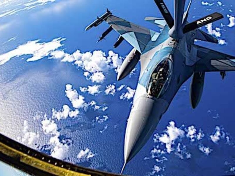 An Air Force F-16 Fighting Falcon conducts an aerial refuel with a KC-135 Stratotanker during Cope North near Andersen Air Force Base, Guam, Feb. 18, 2021. The annual exercise promotes stability and security throughout the Indo-Pacific. (U.S. Air Force photo by Senior Airman Duncan C. Bevan)