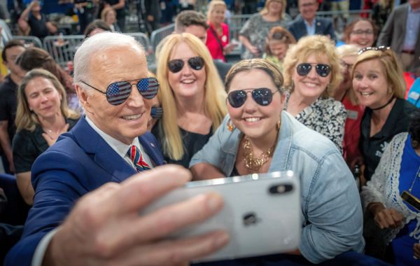 Joe Biden takes a selfie after speaking at a PACT Act event, Tuesday, May 21, 2024, at the Westwood Park YMCA in Nashua, New Hampshire. (Official White House Photo by Adam Schultz)