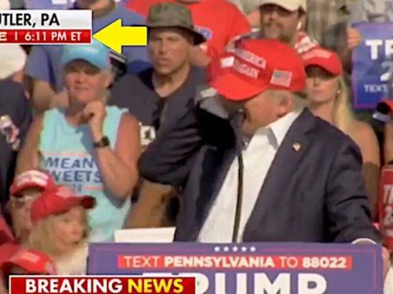 A bullet strikes the ear of former President Donald Trump at 6:11 p.m. Eastern Time in Butler, Pennsylvania, on Saturday, July 13, 2024 (Video screenshot)