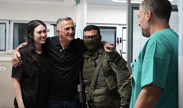 Noa Argamani is embraced by her father, Yaakov, after being rescued on June 8, 2024. (Israel Prime Minister's Office)