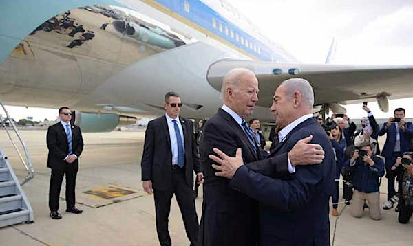 Israel Prime Minister Benjamin Netanyahu welcomes Joe Biden at Ben-Gurion Airport, Oct. 18, 2023. (Photo by Avi Ohayon/Israel GPO)