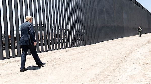 President Donald J. Trump walks along the completed 200th mile of new border wall Tuesday, June 23, 2020, along the U.S.-Mexico border near Yuma, Arizona. (Official White House photo by Shealah Craighead)