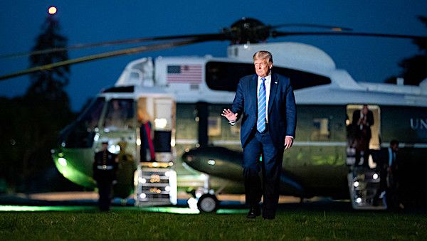 President Donald J. Trump waves after disembarking Marine One on the South Lawn of the White Wednesday, July 29, 2020, following his visit to Texas. (Official White House photo by Tia Dufour)