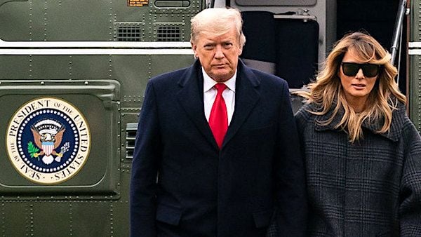 President Donald J. Trump and First Lady Melania Trump walk across the South Lawn of the White House after disembarking Marine One Thursday, Dec. 31, 2020, concluding their trip to Palm Beach, Florida. (Official White House photo by Andrea Hanks)