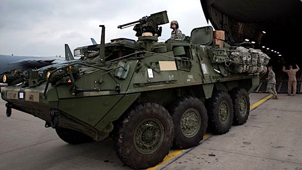 A 2nd Cavalry Regiment Stryker off-loads from a C-17 Globemaster III in support of Steadfast Javelin II Sept. 4, 2014, at Ramstein Air Base, Germany. (U.S. Air Force photo by Senior Airman Damon Kasberg)