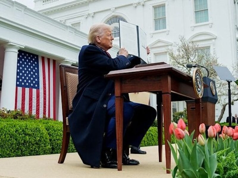 President Donald Trump signs new tariffs in the White House Rose Garden on Liberation Day, Wednesday, April 2, 2025 (Official White House photo)