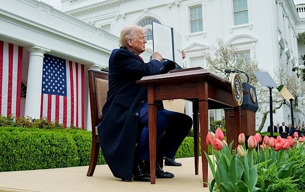 President Donald Trump signs new tariffs in the White House Rose Garden on Liberation Day, Wednesday, April 2, 2025 (Official White House photo)