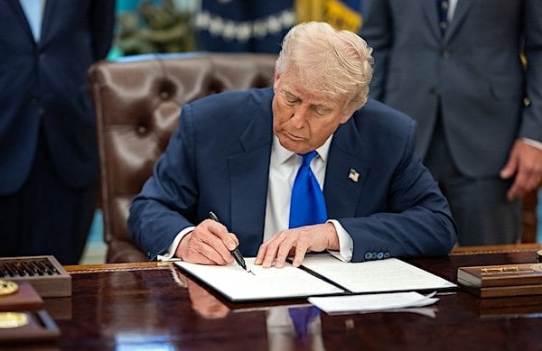 President Donald Trump signs executive orders flanked by Secretary of Health and Human Services Robert F. Kennedy, Jr. and Director of the National Institutes of Health Jay Bhattacharya, Monday, May 5, 2025, in the Oval Office. (Official White House photo by Molly Riley)