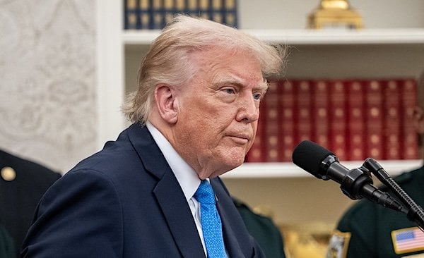 President Donald Trump gives remarks after presenting the newly-created 'Medal of Sacrifice' to three fallen officers' families from the Palm Beach County Sheriff's Office, Monday, May 19, 2025, in the Oval Office. (Official White House photo by Joyce N. Boghosian)