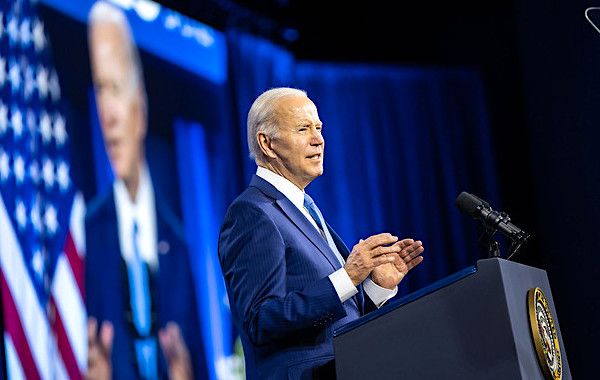 Joe Biden delivers remarks at the National League of Cities Congressional City Conference, Monday, March 14, 2022, at the Marriott Marquis in Washington, D.C. (Official White House photo by Adam Schultz)